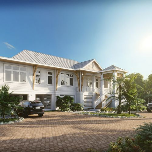 A sunny tropical home with palm trees, a two-story house, and parked cars along a brick driveway, bright and welcoming.